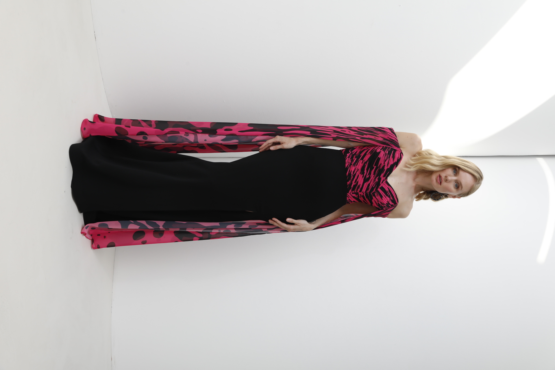 Fuchsia and black brushstroke print off-shoulder mermaid gown with flowing cape sleeves
