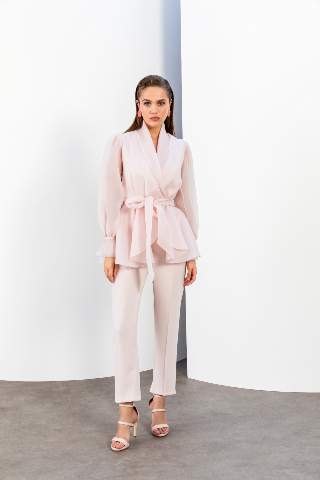 Blush pink belted blouse and tapered trouser suit
