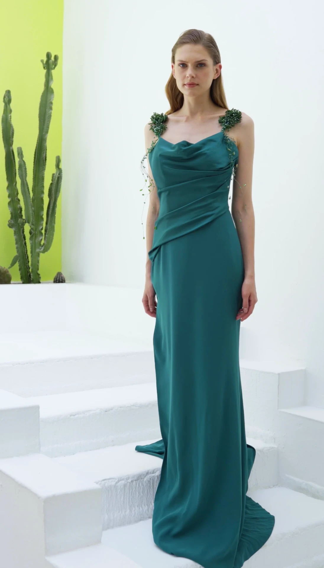 Teal satin cowl-neck column gown with beaded floral shoulder straps