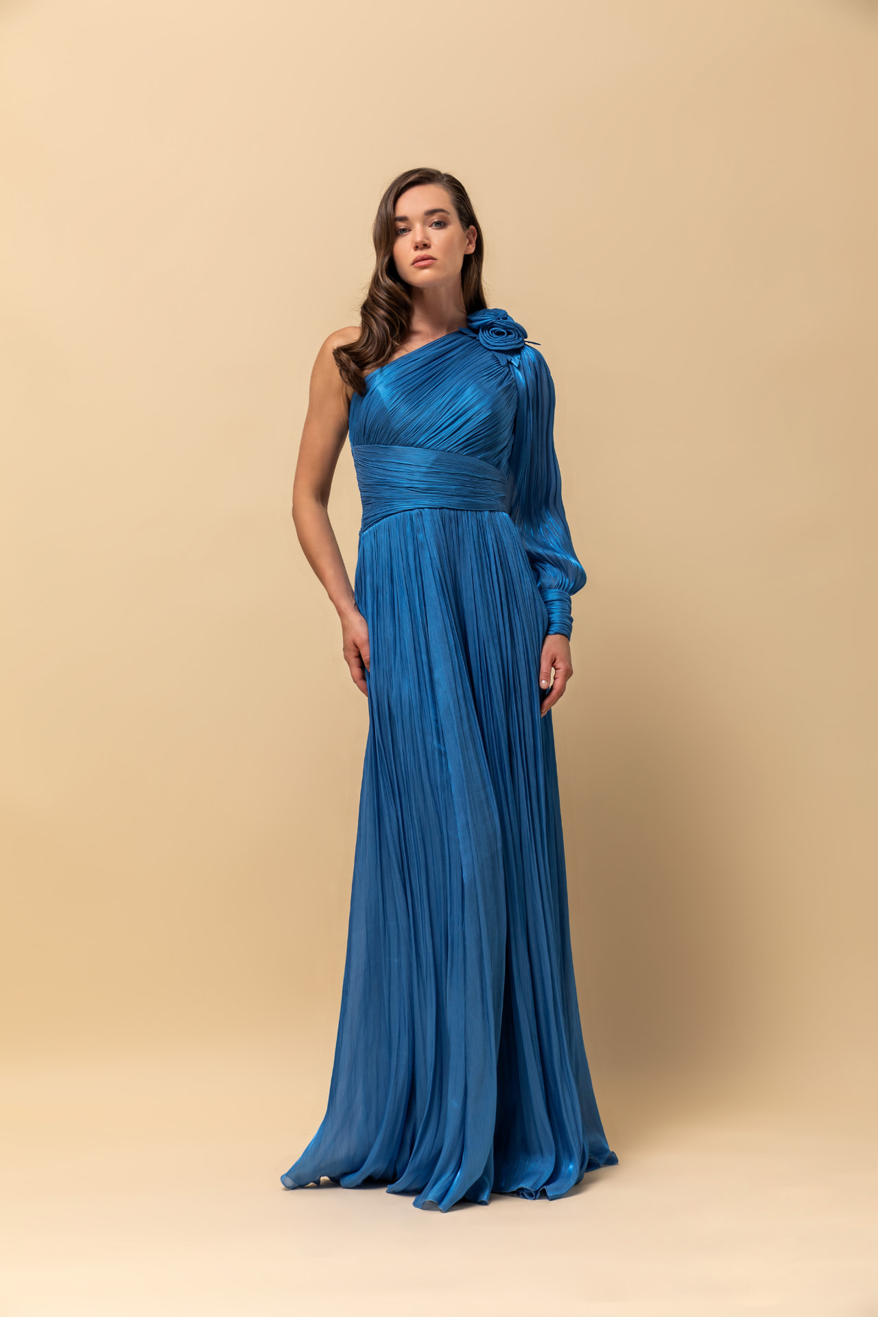 Cobalt pleated chiffon one-shoulder gown with rose shoulder detail