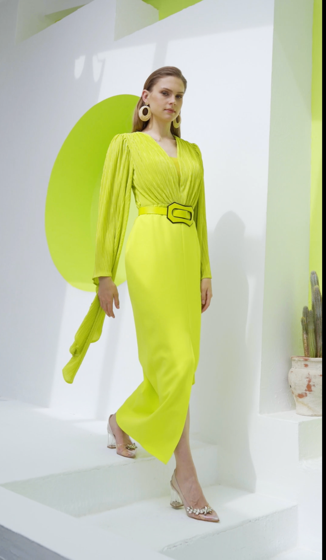 Neon lime long-sleeve pleated midi dress with statement buckle belt
