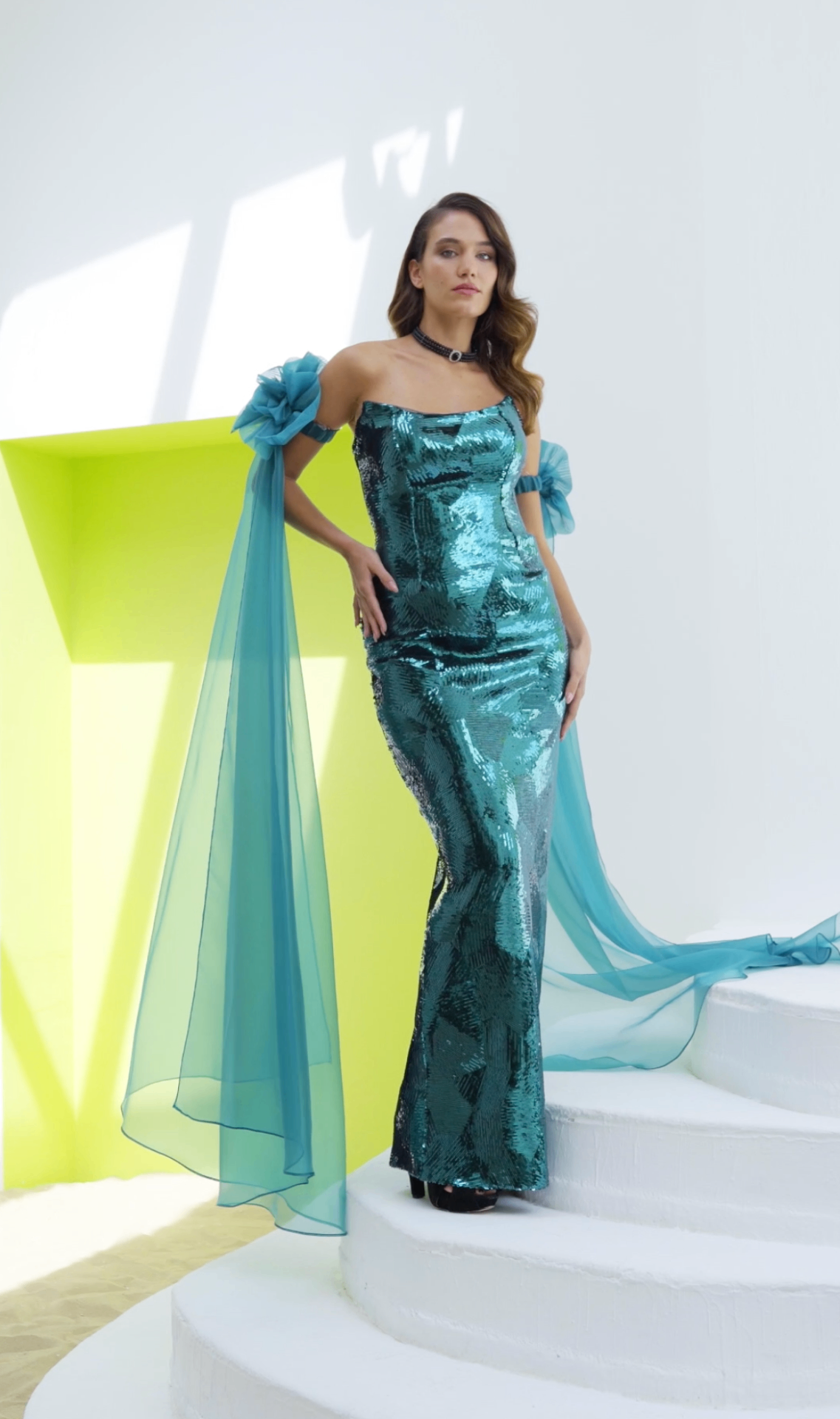 Teal sequin strapless mermaid gown with organza off-shoulder cape sleeves