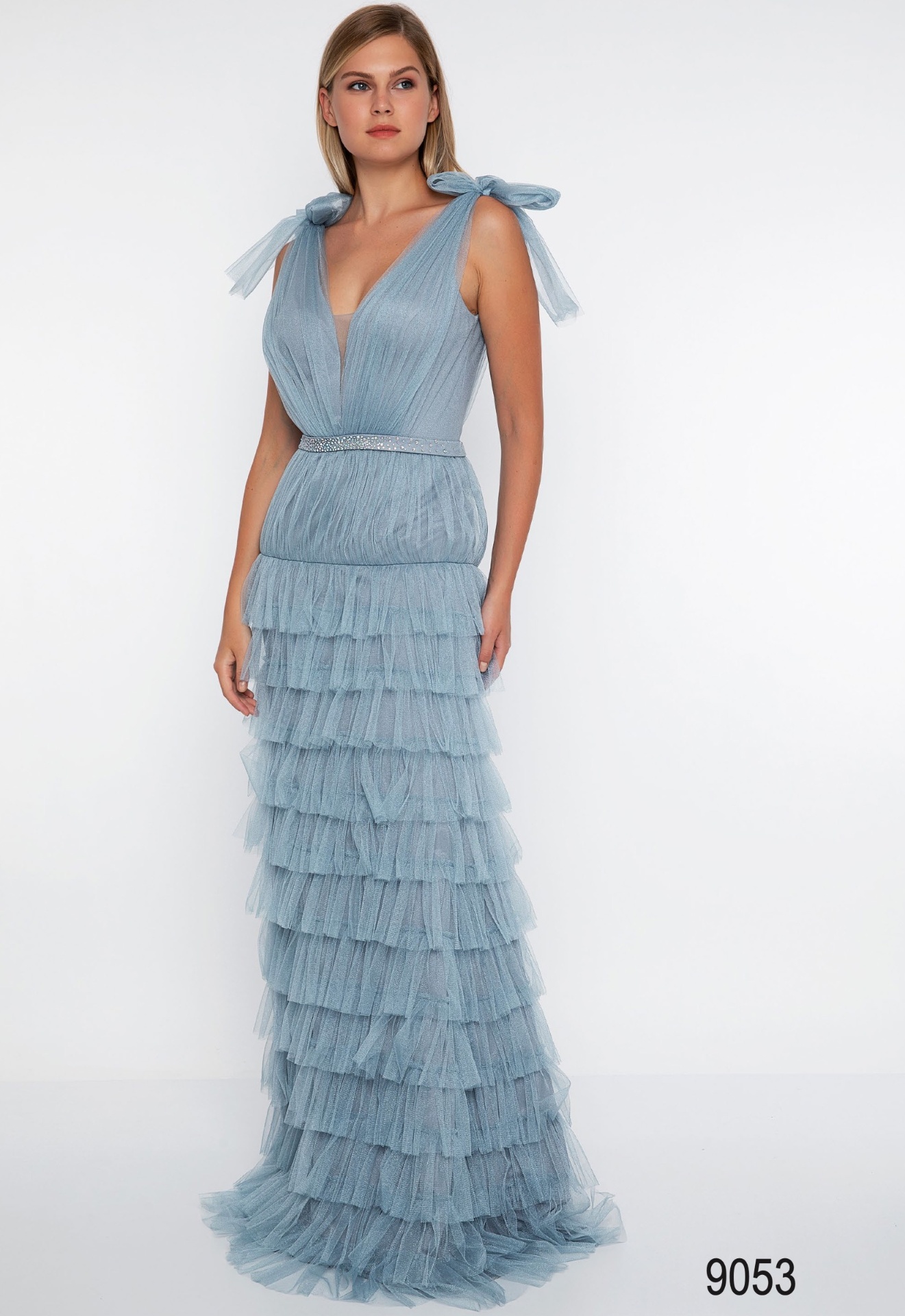 Powder blue tiered tulle gown with shoulder bows
