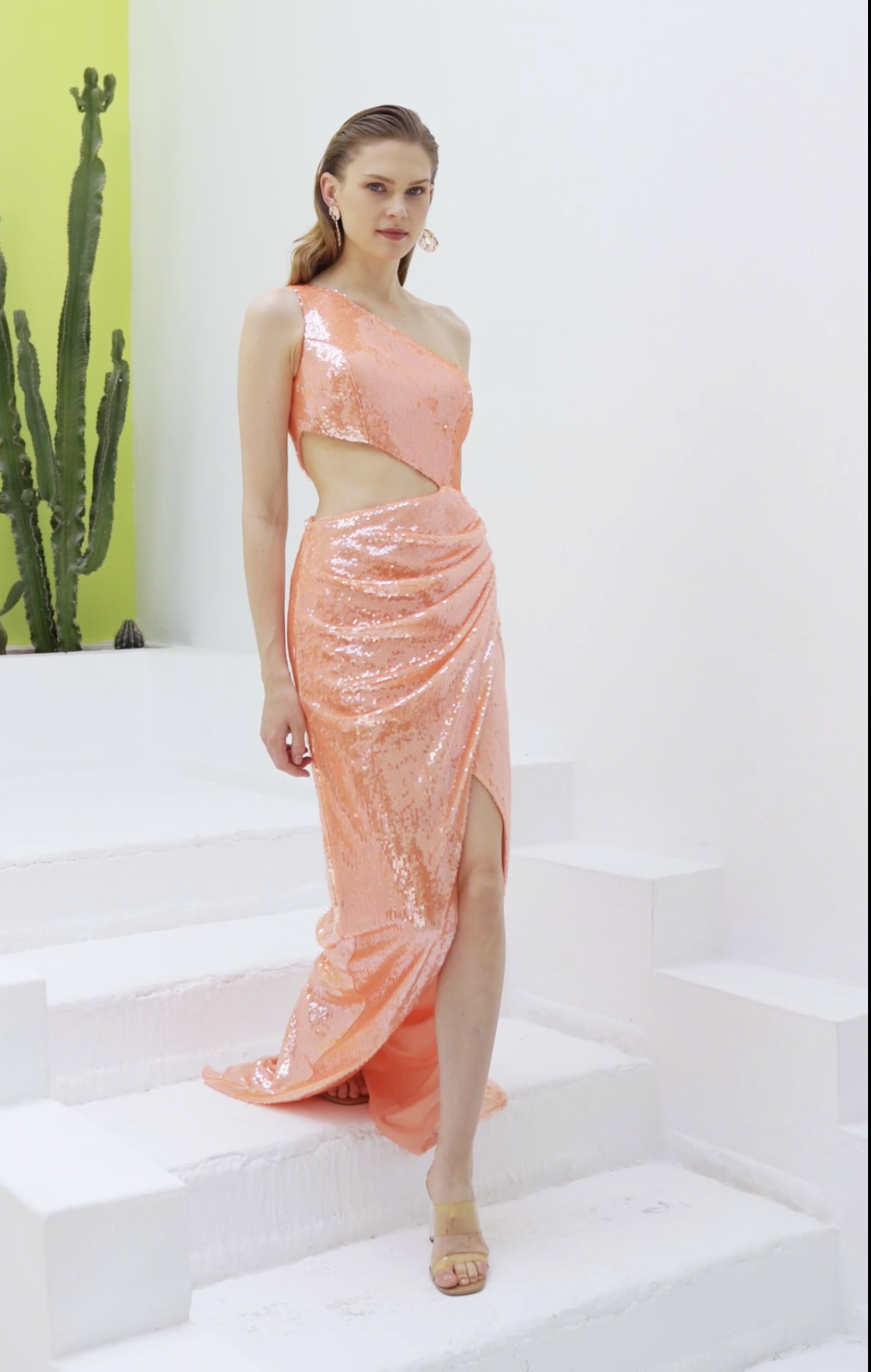 Coral sequin one-shoulder cutout gown with draped high slit skirt