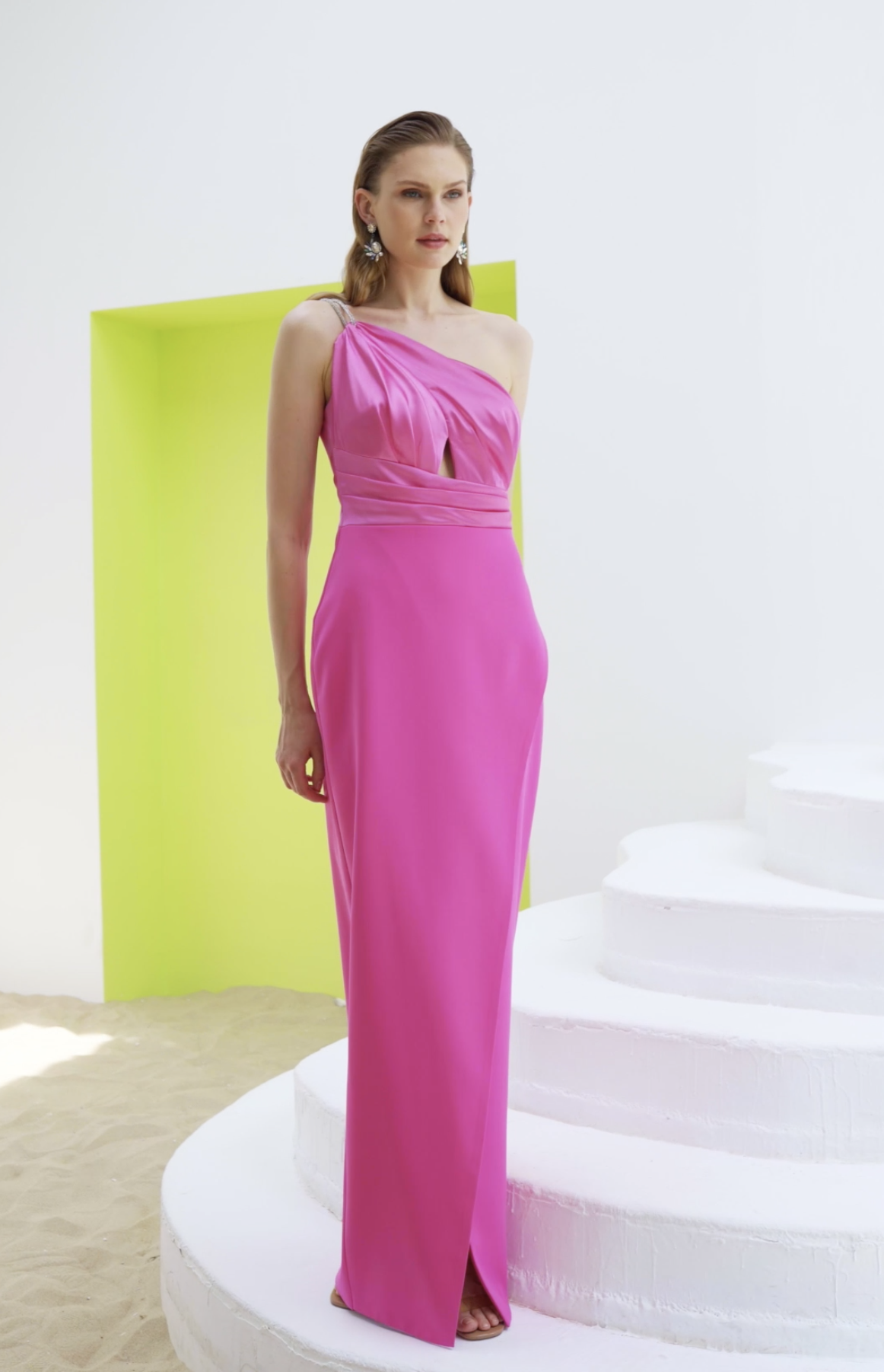 Pink one-shoulder satin gown with crystal strap, cutout bodice and front slit