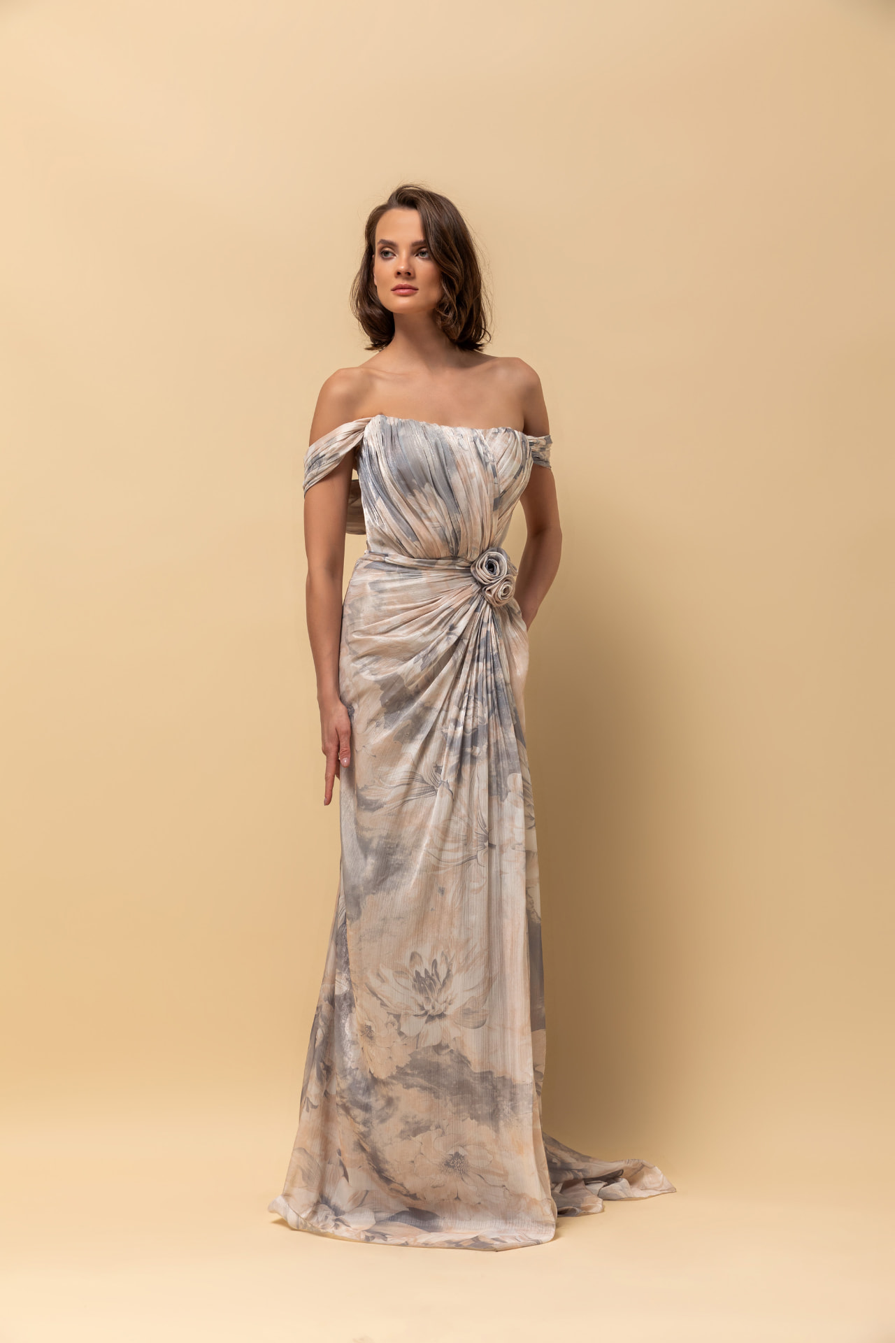 Ivory and grey floral print off-shoulder gown with rosette waist